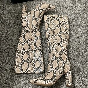 Aqua snake print boots
